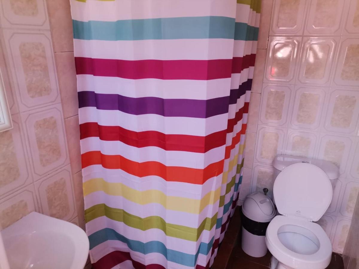 Habitación Triple Básica con baño compartido